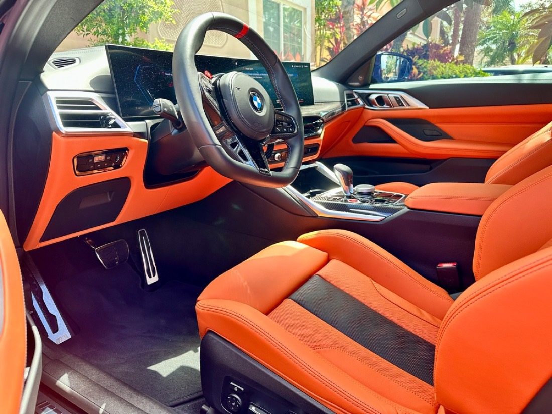 Orange leather BMW interior after cleaning