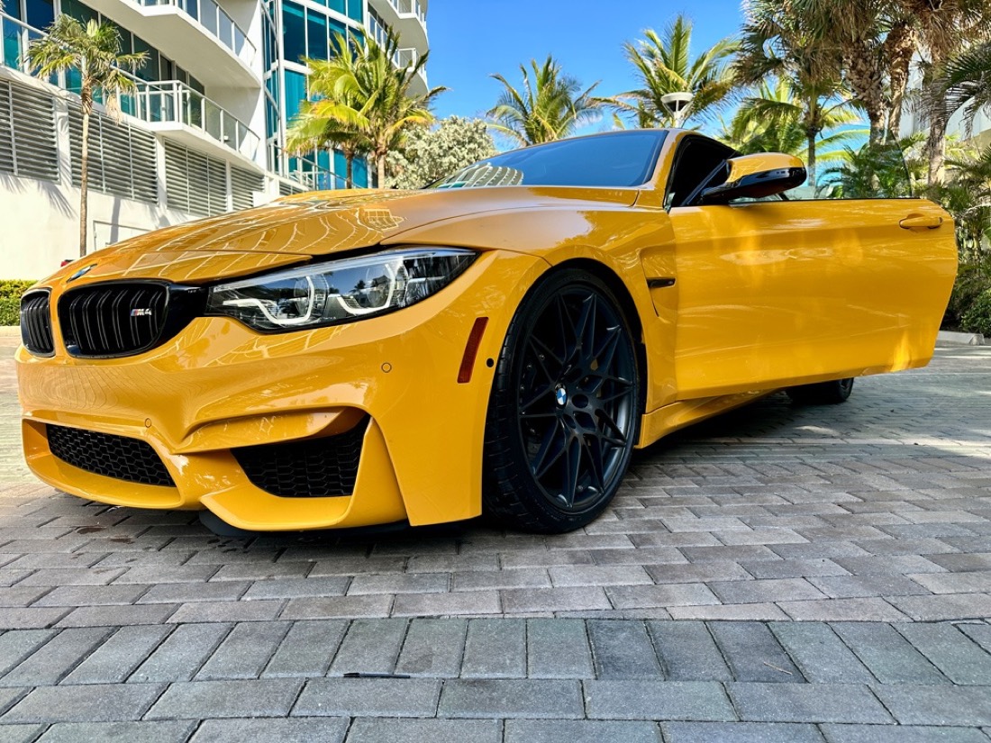 Yellow BMW M4 after a detail